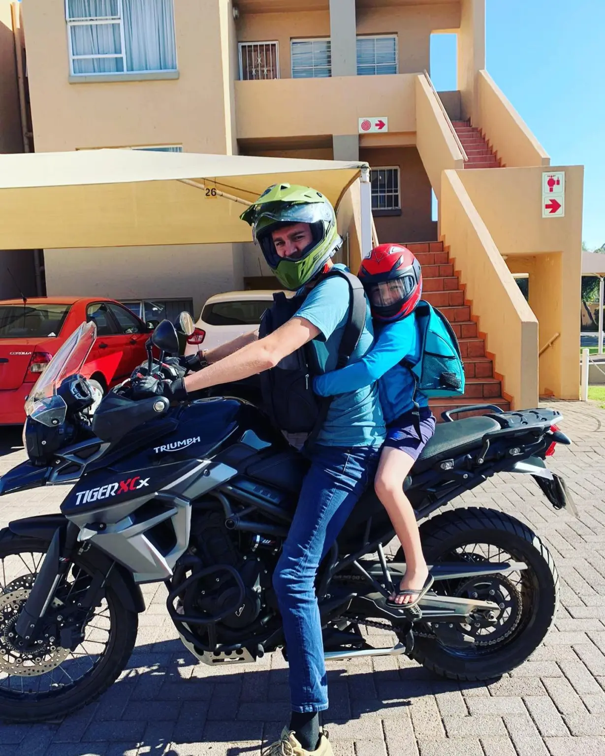 Photo by Jean Claude Murphy: Me and my boy heading out to school on the bike for the first…