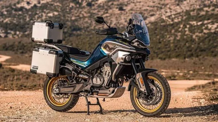 CFMOTO 800MT-X with aluminium panniers parked on a dirt track