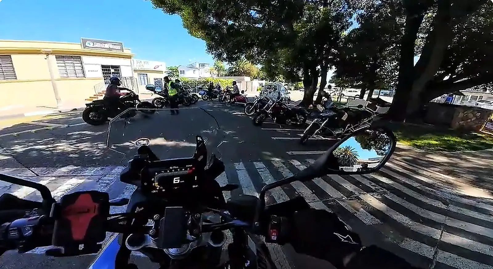 Motorcycles parked outside Harvard Café in Germiston at the end of Synergy Racing Academy's October Social Ride