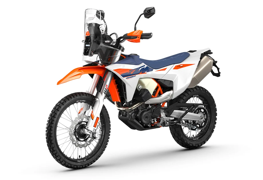 2027 KTM 690 Rally front three-quarter view in white, blue and orange