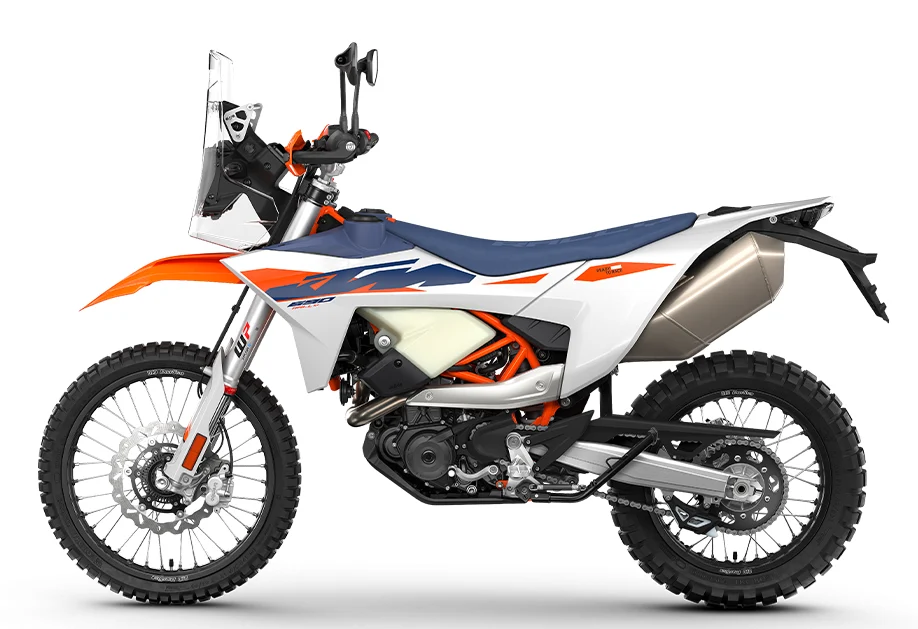 2027 KTM 690 Rally side view, with the translucent front fuel tank visible beside the engine