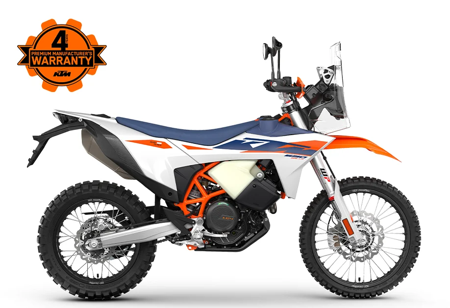 2027 KTM 690 Rally side view with KTM's four-year premium manufacturer's warranty badge