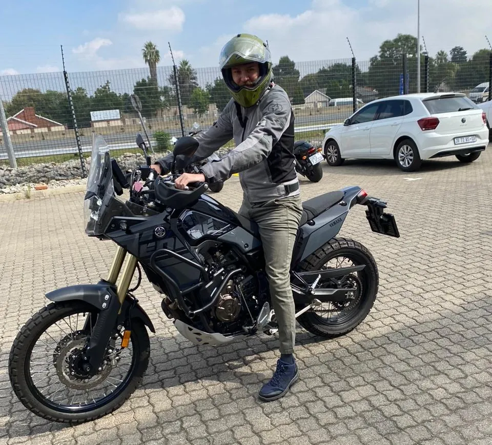 Rider on a black Yamaha adventure motorcycle at the Mandela Day charity run