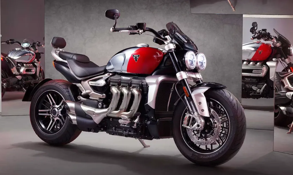 Triumph Rocket 3 in red and silver showing its triple-cylinder engine