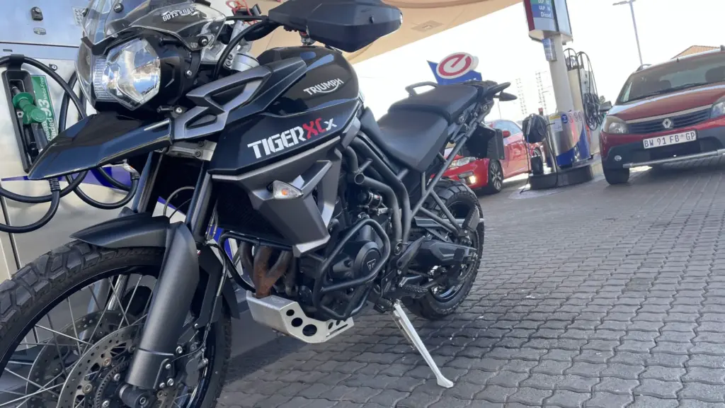 Triumph Tiger 800 XCx at a fuel stop
