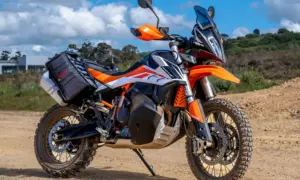 KTM adventure bike fitted with Turkana Gear soft luggage on a dirt yard