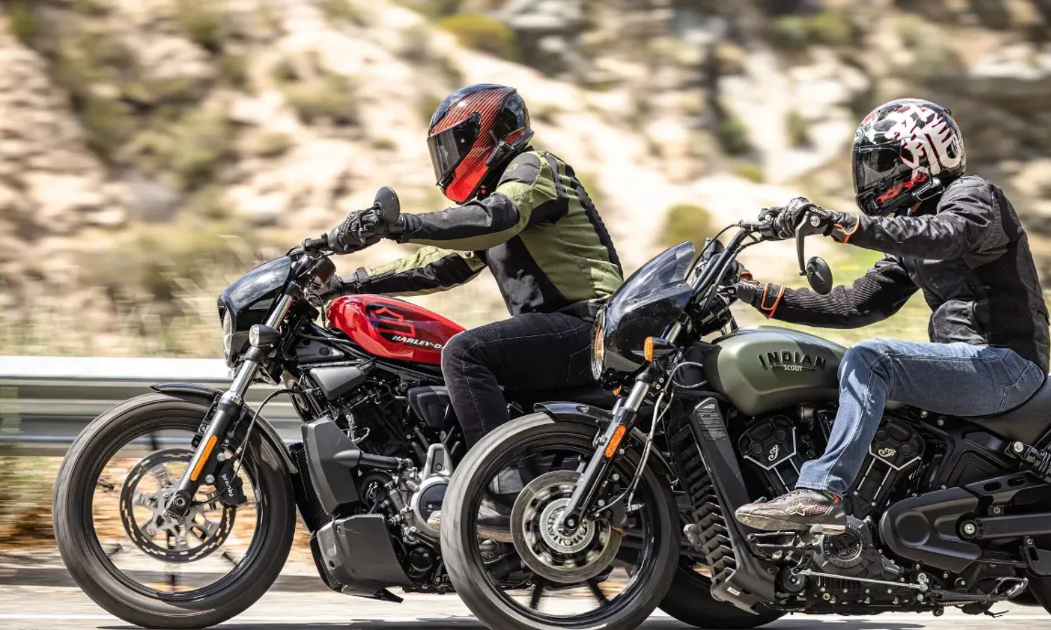 Riders on a Harley-Davidson and an Indian cruiser on a mountain road
